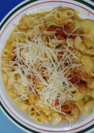 Una foto de Fideos con salsa de zapallo y queso