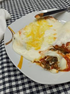 Una foto de Canelones de espinacas y setas variadas con atún