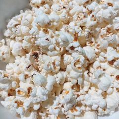 A picture of Popcorn on the stove.