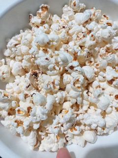 A picture of Popcorn on the stove.