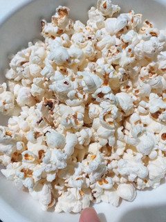 A picture of Popcorn on the stove.