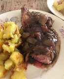Lamb steak with red wine and onion sauce
