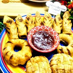 A picture of Different styles chicken with Aloo Samosa.