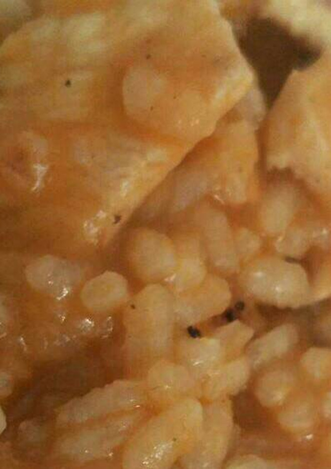 Una foto de Arroz con pollo
