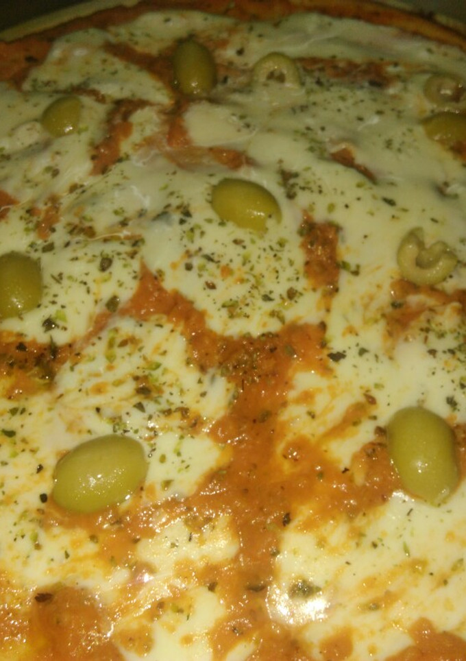 Una foto de Pizza en licuadora sin levadura sin amasar 🍕