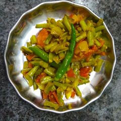 A picture of Barbati Tomato Kura or Yard Beans with tomato.