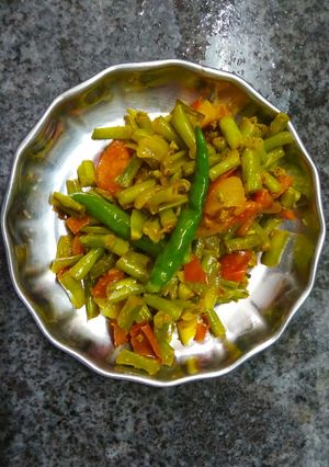 A picture of Barbati Tomato Kura or Yard Beans with tomato.