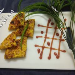 Spicy Pancakes From Yellow Lentil Ramladoo Pancakes A picture of Spicy Pancakes From Yellow Lentil Ramladoo Pancakes.