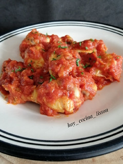 Una foto de Alitas con tomate