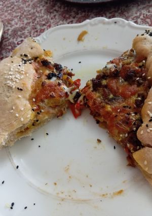 عکسی از دستور پیتزا کنجدی