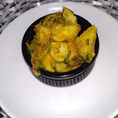 A picture of Batata ni sukhi bhaji goan style.