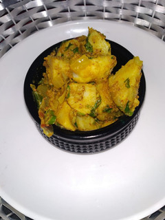 A picture of Batata ni sukhi bhaji goan style.