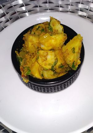 A picture of Batata ni sukhi bhaji goan style.