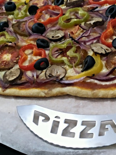Una foto de Pizza vegetal
