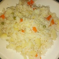 A picture of White rice with veggies.