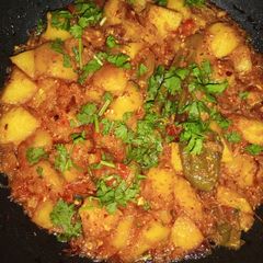 Indian style tomato and potato masala A picture of Indian style tomato and potato masala.