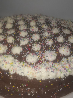 Una foto de Torta de Naranja, Ganache y Mousse