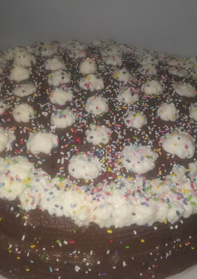 Una foto de Torta de Naranja, Ganache y Mousse