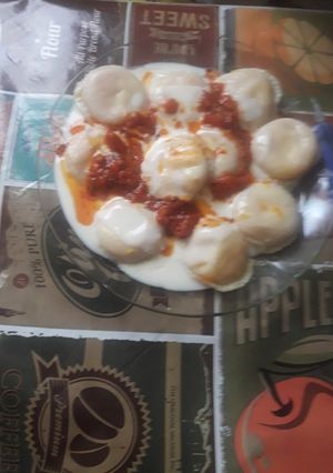 Una foto de Sorrentinos de calabaza y queso