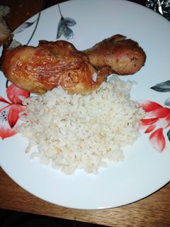 A picture of Lemon Chicken with Pilaf.