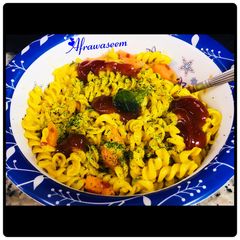 A picture of Schezwan macaroni pasta with garlic mayonnaise.