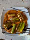 Puerros al horno con salsa de pimientos del piquillo
