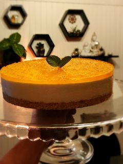Una foto de Cheesecake de yogur y mandarina 🍊 (sin horno!!)