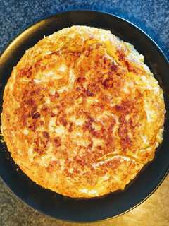 Una foto de Tortilla de patatas y calabacín