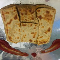 A picture of Paneer cheese pocket paratha.