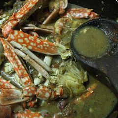 A picture of Njandu Rasam (Crab rasam).