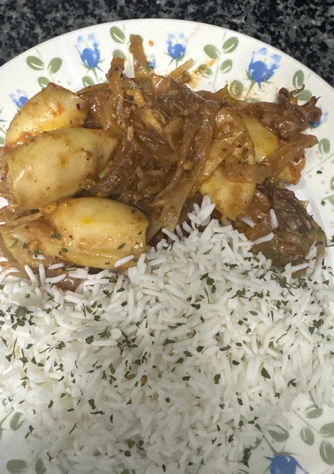 Una foto de 551. Calamares en salsa de almendras (principal pescado)