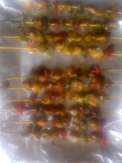 A picture of Chicken in skewers.