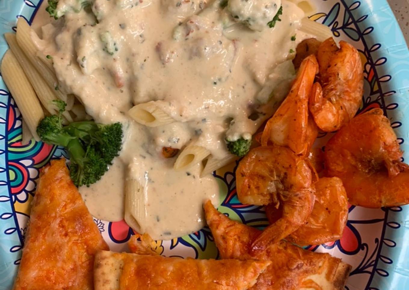 Bobby&Whittney”s Homemade Penne Chicken Alfredo with broccoli and shrimp