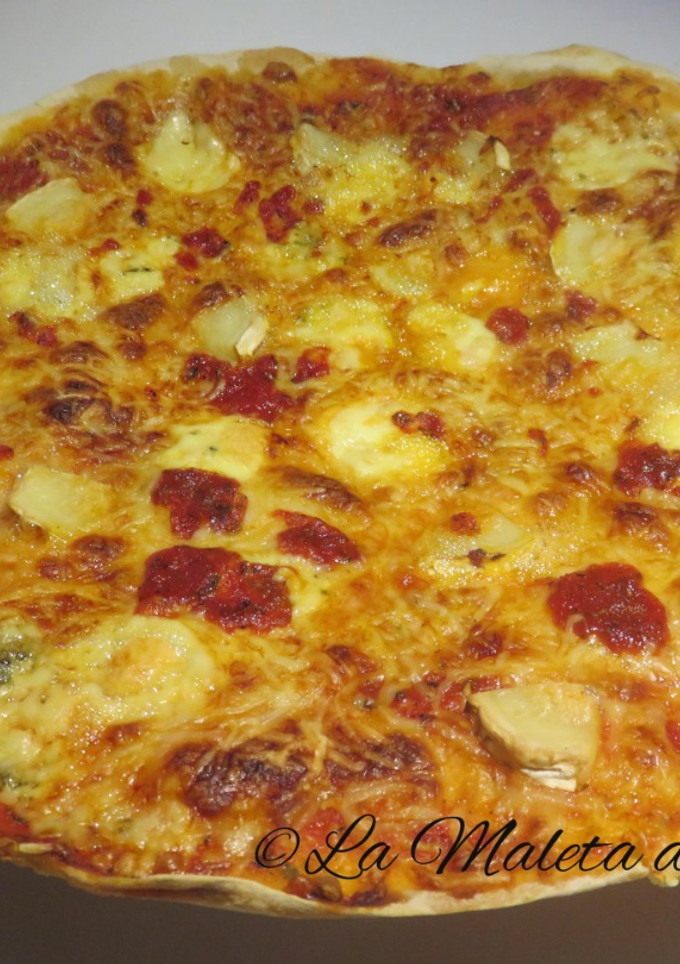 Una foto de Pizza 5 quesos