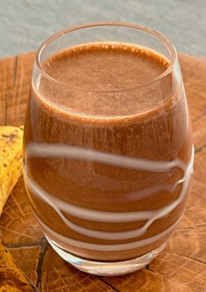 Hình của món 🌱 Smoothie Chuối Ca Cao Quế Bơ Đậu Phộng (Vegan).