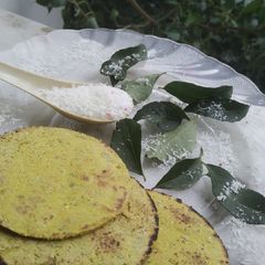 A picture of Coconut masala jowar coins sorghum roti.