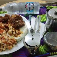 A picture of Boiled yam,with fried egg and beef.