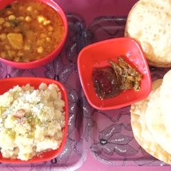 Chick peas potato halwa poori A picture of Chick peas potato halwa poori.