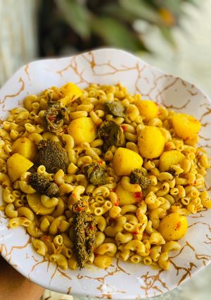 A picture of Macaroni jollof with potatoes.