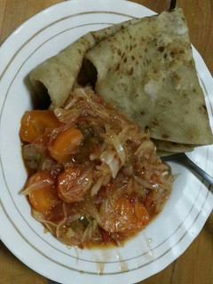 A picture of Chapati with spiced cabbages.