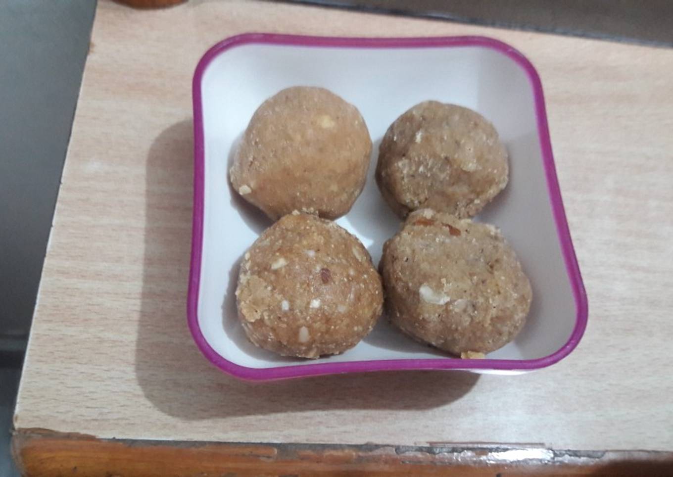 Wheat flour laddu (pini)