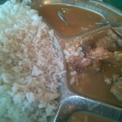 Beef stew and rice A picture of Beef stew and rice.