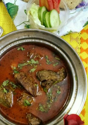 A picture of Chicken kaleji with gravy.