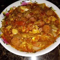 A picture of Fish and sausage sauce.