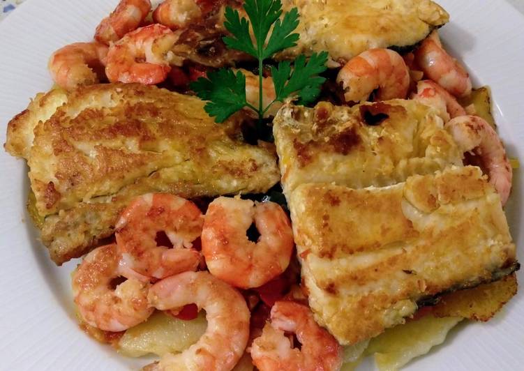 Merluza a la plancha y salteado de verduras con langostinos