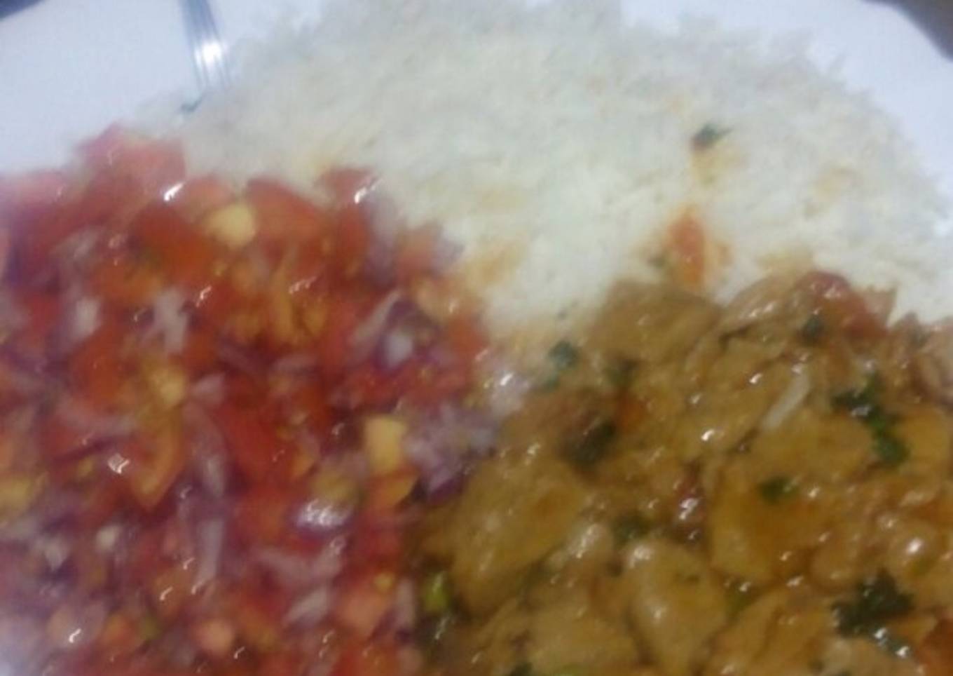 Beef stew with kachumbari and rice