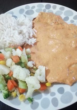 A picture of Chicken Breasts in Chipotle Sauce with Rice and Vegetables 🍛.