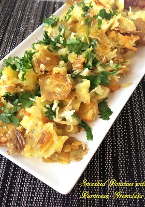 A picture of Smashed Potatoes with Parmesan Gremolata.