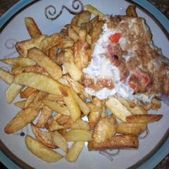 Fried potatoes and fried egg A picture of Fried potatoes and fried egg.