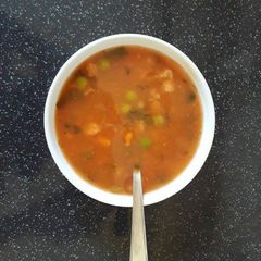 A picture of Tomato and pea soup.
